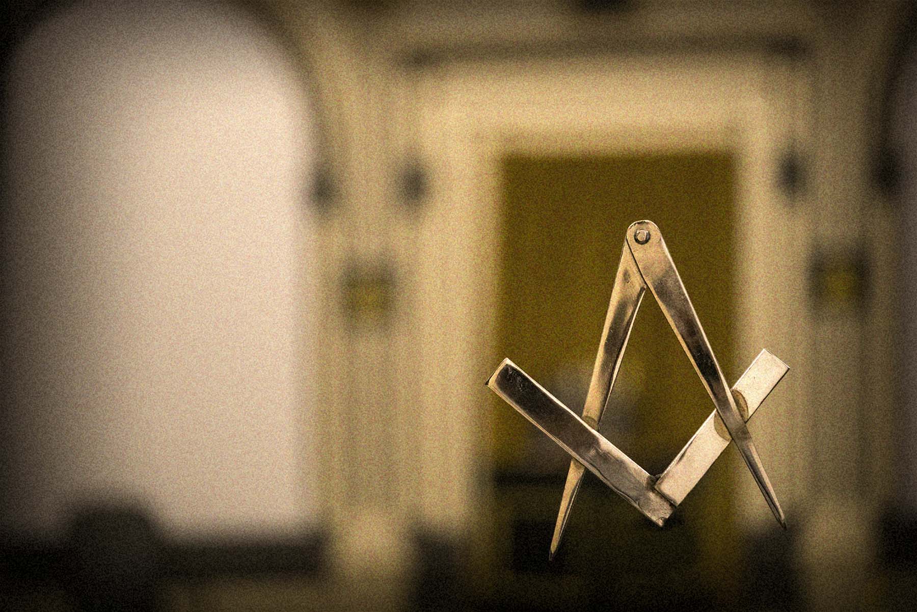 Passer en winkelhaak — symbool van de vrijmetselarij
